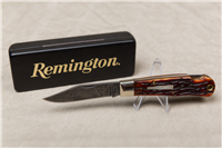 1999 REMINGTON UMC R1303-D Damascus Lockblade Silver Bullet Knife