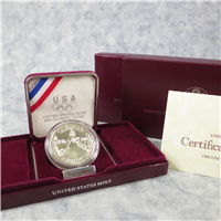 Olympic Silver Dollar Uncirculated in Box with COA  (US Mint, 1988)