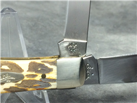 2006 CASE XX 6254 SS Burnt White Smooth Bone Trapper Knife *Leopard Design*